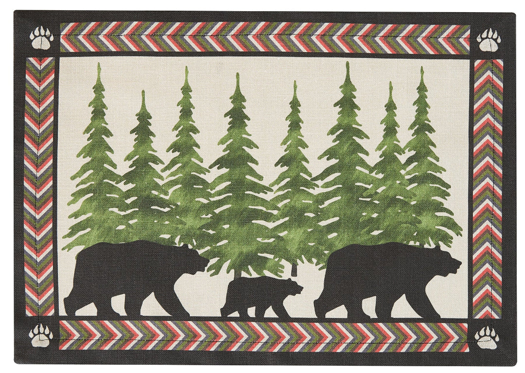 Decorative placemat with bear and tree design in a decorative border