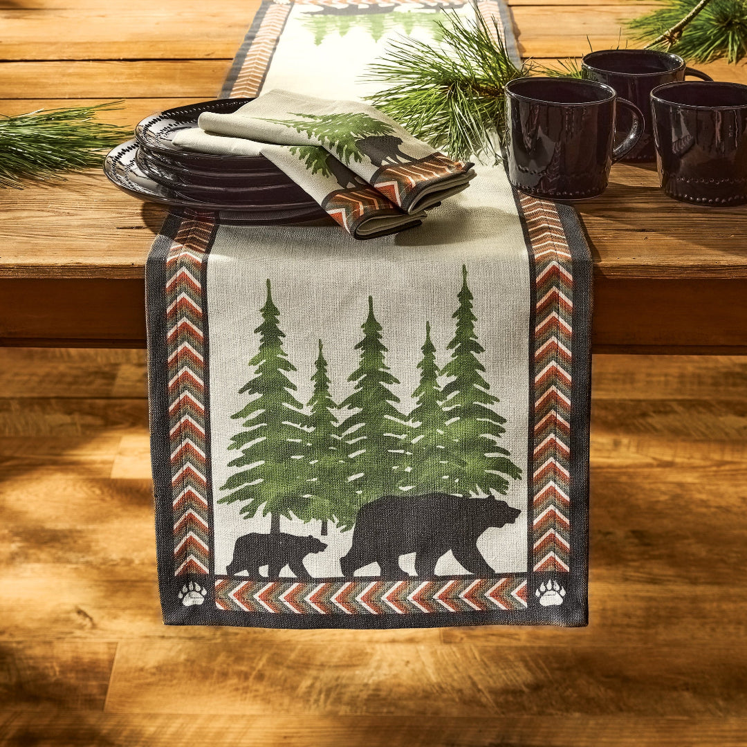 Table Runner with a bear and tree pattern