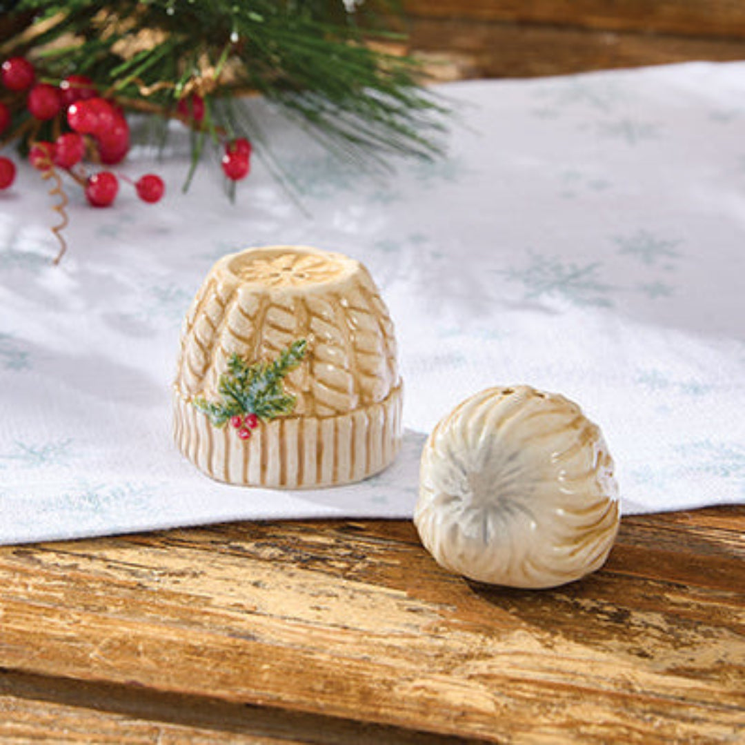 Decorative Salt & Pepper Shaker set on a wooden surface with a Christmas-themed background