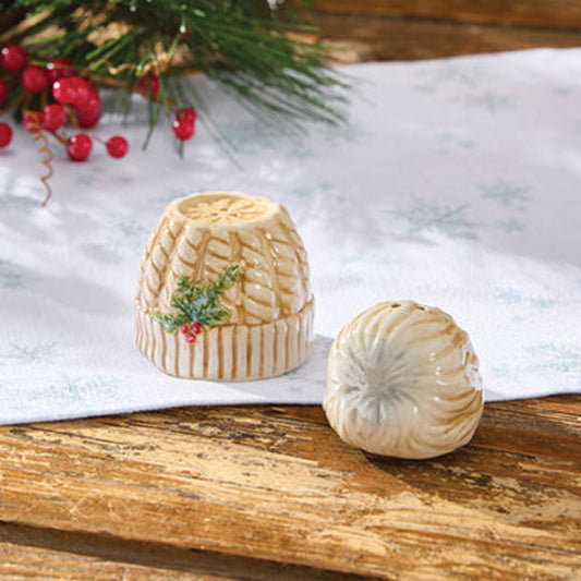 Decorative Salt & Pepper Shaker set on a wooden surface with a Christmas-themed background