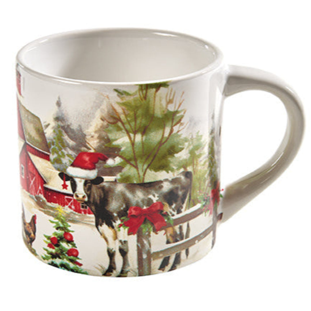 Mug with Christmas-themed cow design on a white background