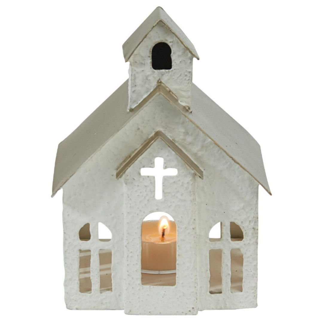 White church-shaped lantern with a candle inside on a white background. Christmas Decor