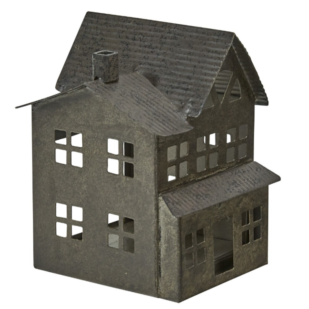 Metallic house-shaped lantern on a white background. Christmas Decor