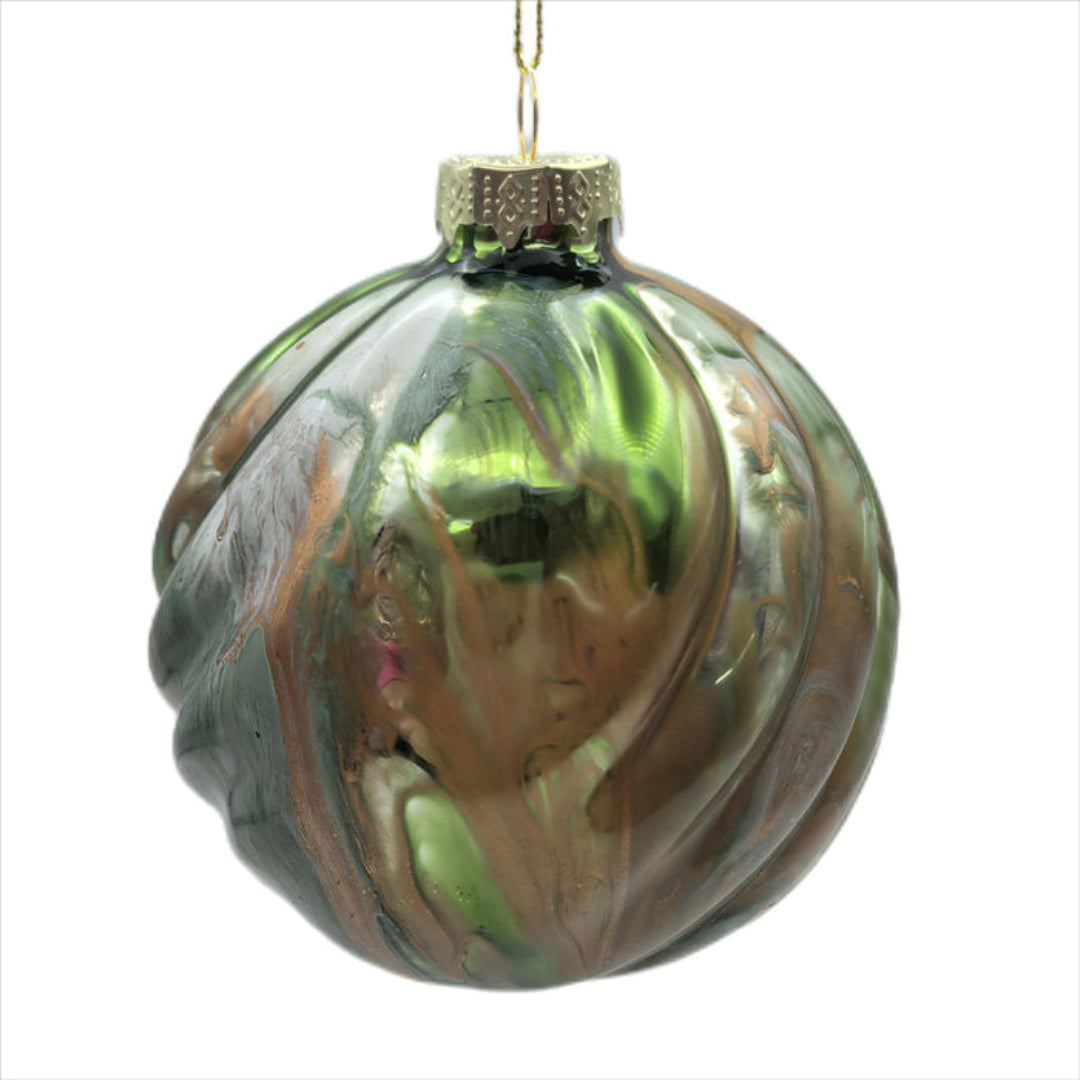 Decorative glass ornament with green and brown marbled pattern on a white background