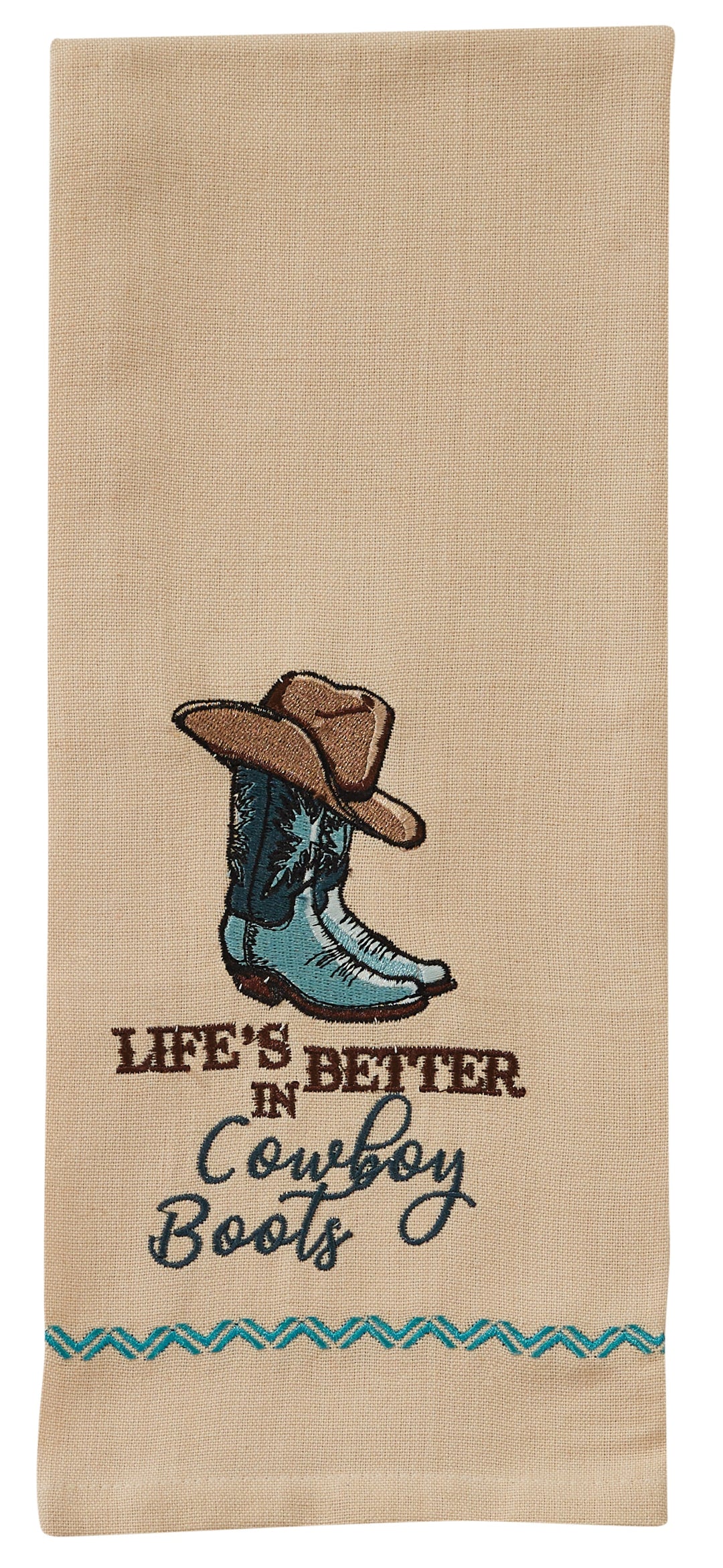 Embroidered towel with cowboy hat and boots design and text 'Life's Better in Cowboy Boots' on a beige background.