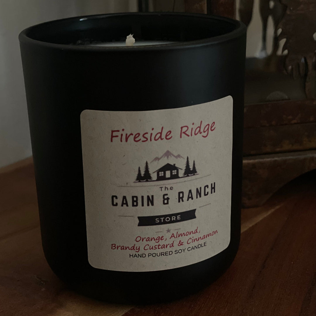 Fireside Ridge Candle combines warm spice, sweet dried fruits, and smooth brandy to create a deeply cozy fragrance inspired by evenings spent beside a glowing fire in a mountain lodge.