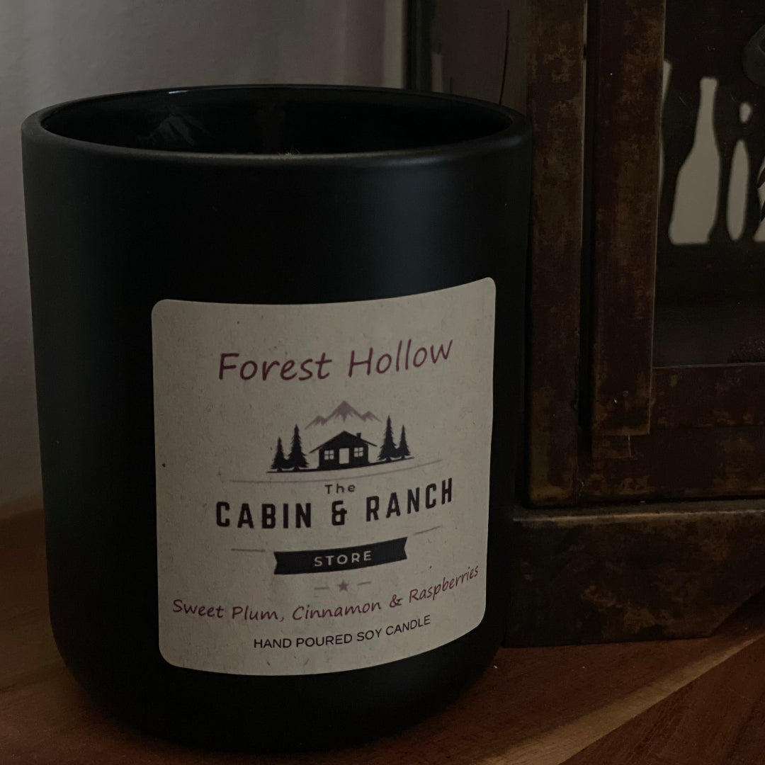 Forest Hollow Candle blends delicate plum with warm vanilla and subtle forest musk from The Cabin & Ranch Store