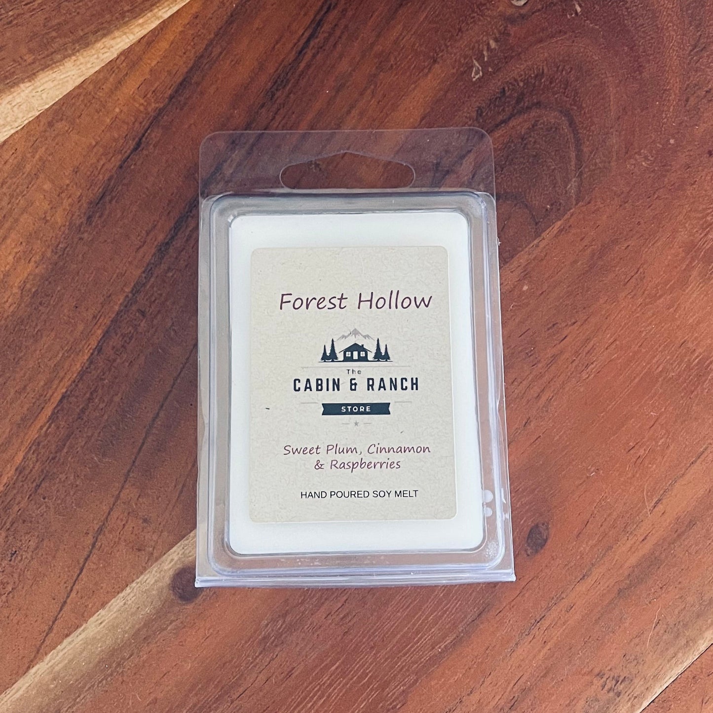 Forest Hollow Wax Melts blend a delicate plum with warm vanilla and subtle forest musk fragrance from The Cabin & Ranch Store.