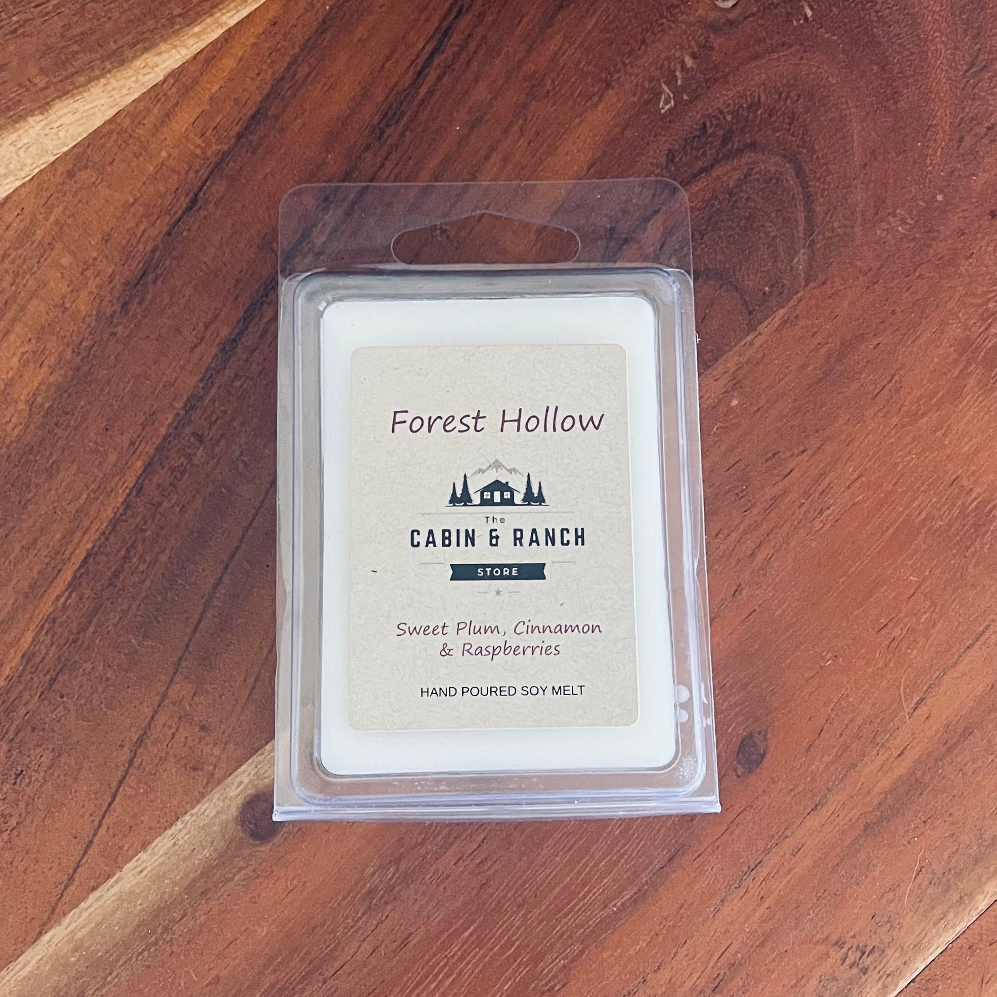 Forest Hollow Wax Melts blend a delicate plum with warm vanilla and subtle forest musk fragrance from The Cabin & Ranch Store.