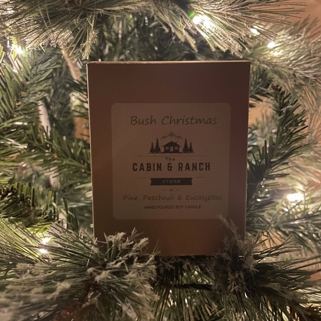 Gift Box of 'Bush Christmas' from The Cabin & Ranch Store brand on a Christmas tree.