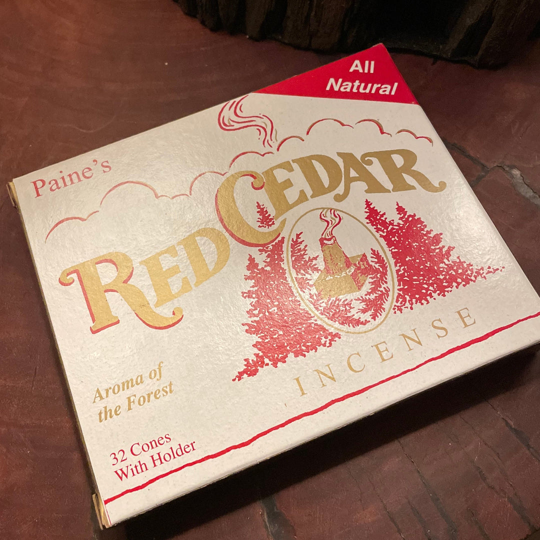 Box of Red Cedar incense on a wooden surface