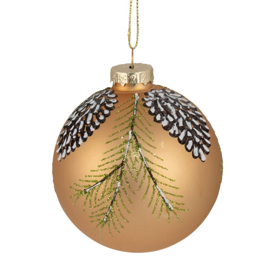 Gold Christmas ornament with greenery and pinecones on a white background