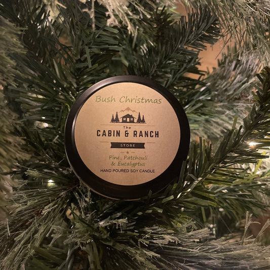 Bush Christmas Candle from The Cabin & Ranch Store on a Christmas tree